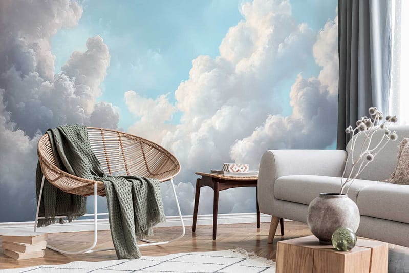 Blue sky and white cloud wallpaper; features soft, fluffy clouds on a bright blue background; evokes calm, serenity, and openness.