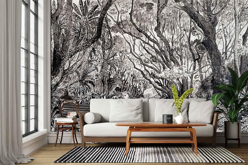 Black-and-white wallpaper mural depicts leafy forests of Cape Town; features intricate tree branches, dense foliage, and layered shades of grey to white. Monochrome botanical details create texture and depth across the wall.