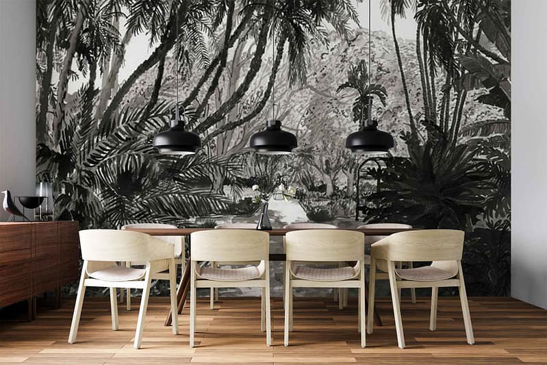 Grayscale tropical jungle wallpaper featuring detailed palm leaves, banana trees, and lush exotic foliage in various gray tones. Large-scale botanical patterns, monochrome design with intricate shading and depth. No color—shades of black, white, and gray dominate the mural. Exotic plants and dense leaves throughout.