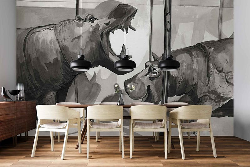 Grayscale wall mural features two large hippos, detailed in black, white, and gray tones. The design emphasizes realistic textures and shading, creating a dramatic black-and-white wildlife scene as the focal point of the dining room. No color accents—strictly monochrome with lifelike animal imagery.