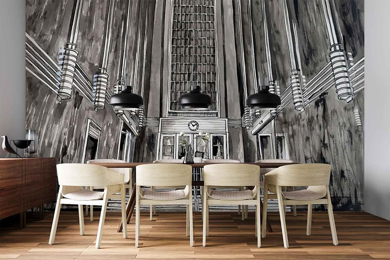 Dramatic black-and-white wallpaper mural depicting an Art Deco interior: tall columns, geometric detailing, and a large central clock. Monochrome color scheme emphasizes bold contrasts and architectural forms.