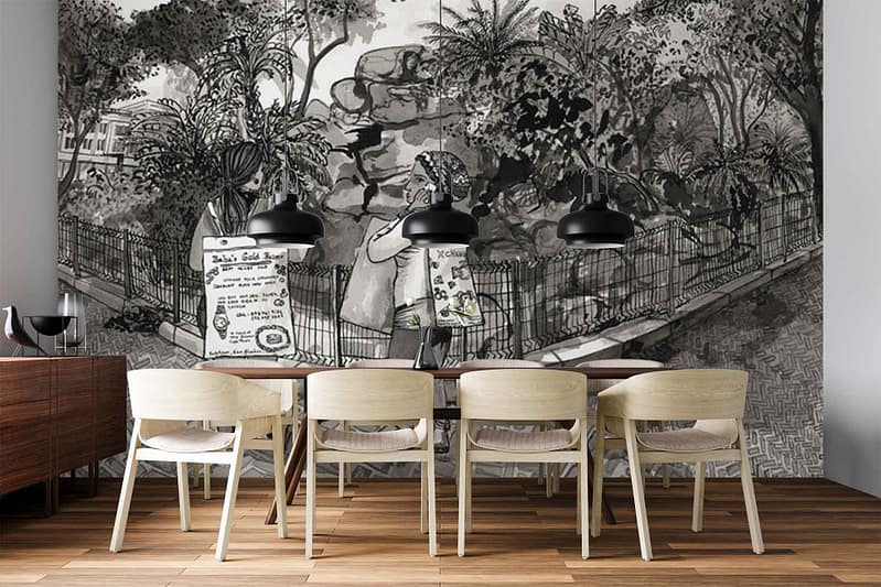 Black and white wall mural wallpaper featuring two people sitting or standing in a park, detailed with a fence and abundant lush greenery; illustrated style with monochrome linework—predominantly black outlines on white background.
