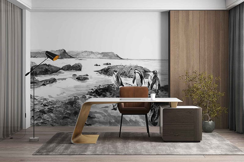 Black-and-white mural wallpaper featuring penguins standing and waddling on a rocky shoreline, with detailed gray rocks and stylized water. Monochrome tones emphasize the contrast between the black feathers, white bellies of the penguins, and textured stone background.