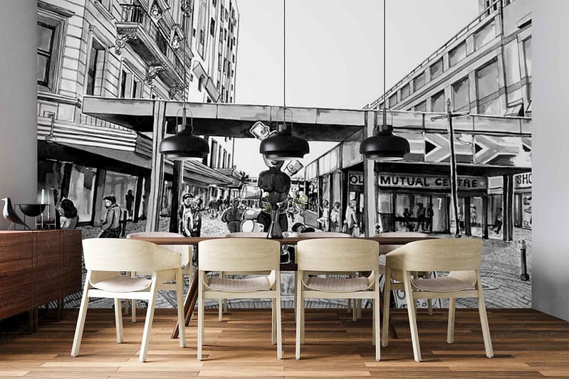 Wallpaper: Black-and-white city street mural featuring tall urban buildings, streetlights, crosswalks, and cars in grayscale tones. Architectural details in shades from deep black to soft gray; high-contrast outlines; evocative of a bustling downtown scene. No color except black, white, and grey.