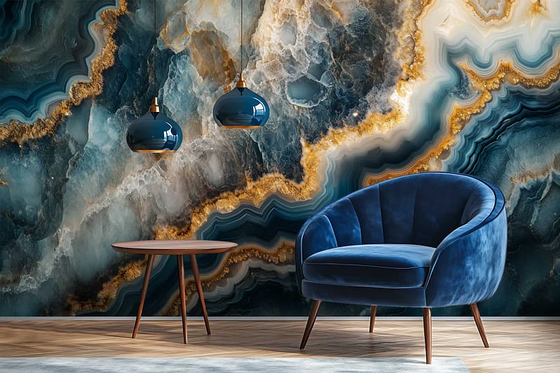 Striking wall mural featuring swirling blue, gold, and white marble patterns with fluid veining, shimmering metallic accents, and bold abstract textures; colors include deep cobalt blue, navy, rich gold, pearly white, and hints of teal.