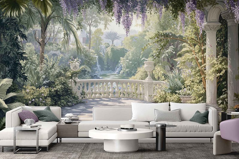 Wallpaper features a mural of a lush, sunlit garden with classic stone balustrades and columns, draped in cascading purple wisteria flowers. Vibrant greenery, dappled sunlight, and blooming floral elements in shades of green, lavender, cream, and gold.