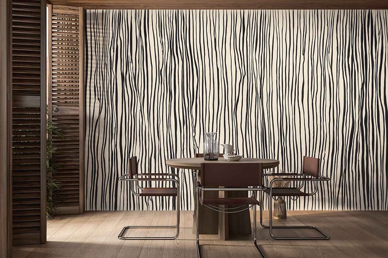 Black and white wavy line wallpaper creates a bold, graphic pattern on the wall. The design features alternating flowing lines in stark black and white, adding a dynamic visual element to the room.