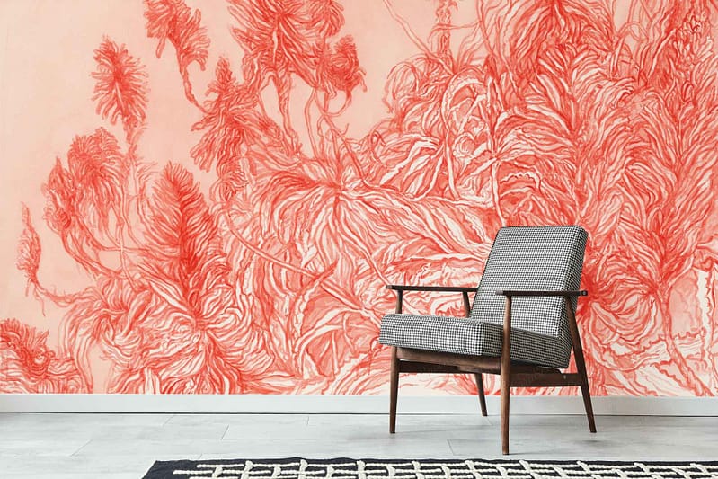 Bold red abstract floral wall mural featuring vibrant red tones and large, stylized flower shapes forms the main backdrop. The wallpaper’s design is the focal point, characterized by eye-catching floral patterns in striking shades of red.