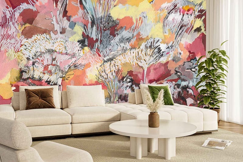 A large abstract floral wallpaper in bold shades of pink, yellow, red, and gray features colorful blooms and dynamic shapes.