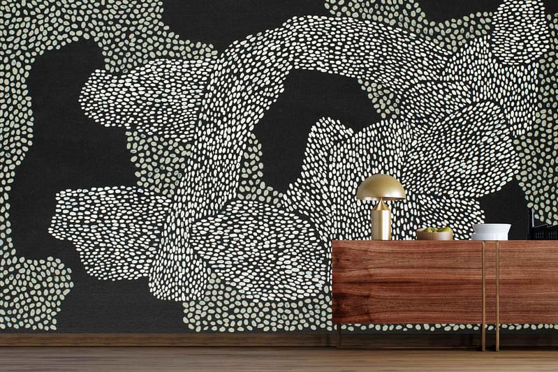 Abstract wallpaper featuring an ebony root-inspired pattern with black and white dots.