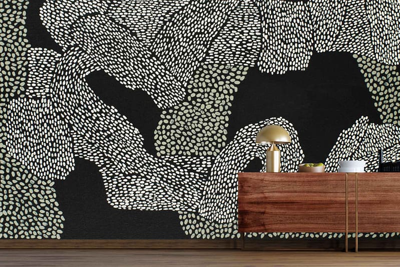 Abstract wallpaper featuring white oval dots arranged in organic, wave-like patterns on a deep ebony black background. The design emphasizes the contrast between bold black and crisp white elements.