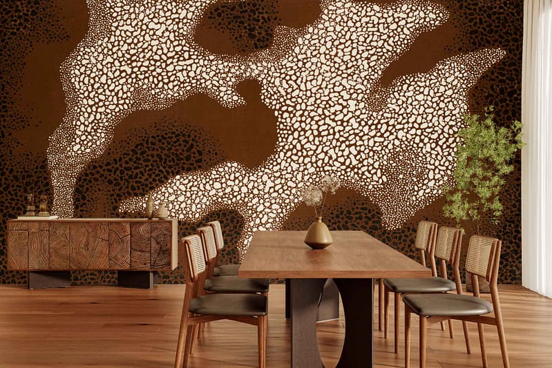 Wallpaper with a bold, abstract pattern in brown and cream tones, featuring organic shapes reminiscent of animal print.