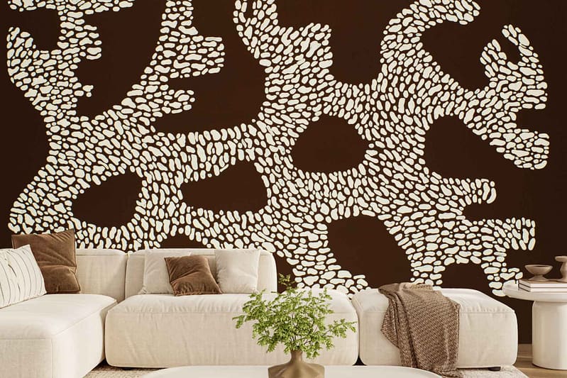 Abstract Ebony Root wall mural featuring irregular white shapes on a rich dark brown background; bold, modern design emphasizing contrast between white and brown elements.