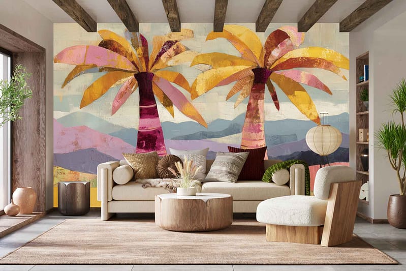 Wall mural with two abstract palm trees, yellow and pink fronds, set against a pastel mountain background; features vibrant island-inspired colors—pink, yellow, blue, and soft purple—creating a tropical vibe.