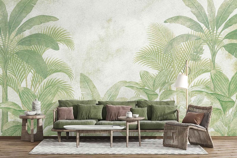 Large leafy green botanical mural wallpaper dominates the wall, featuring oversized leaves in vibrant green tones that create a cheerful, nature-inspired focal point in the room.