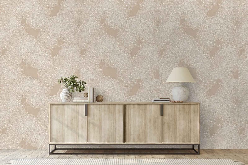 Pastel-patterned wallpaper features soft hues of blue, pink, and sandy beige in gentle, flowing shapes and subtle coastal-inspired motifs.