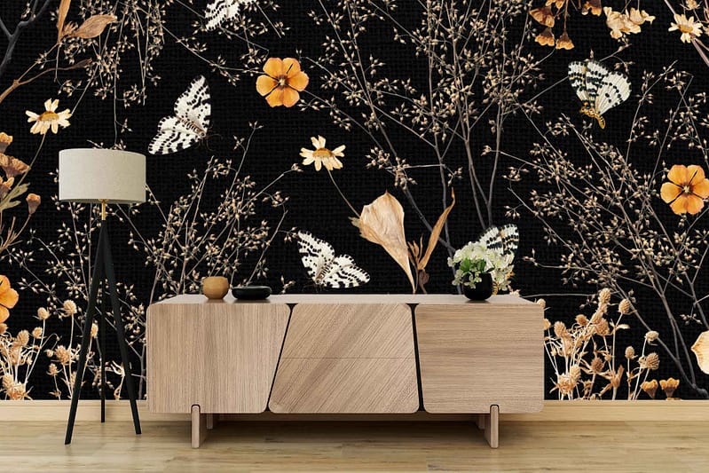 Black floral wallpaper decorated with yellow flowers, delicate branches, and white butterflies.