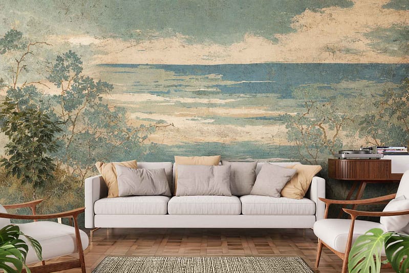 Large Verdant Vista wall mural featuring a serene, vintage-style landscape with lush trees, calm water, and a blue sky; nature-inspired elements in greens, blues, and earth tones.