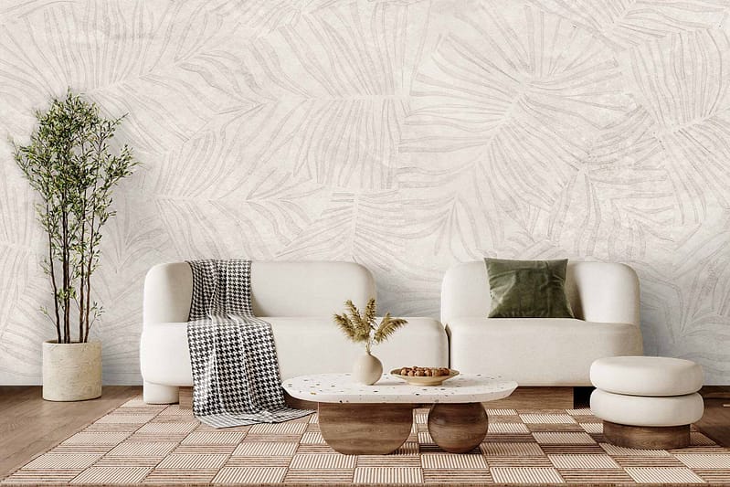 Light, textured wallpaper featuring a subtle leaf pattern in soft neutral tones; the design blends understated whites and beiges, creating a calm modern backdrop.