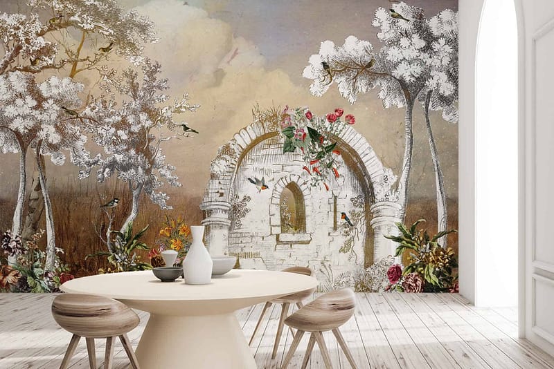 The wallpaper features a weathered stone archway, surrounded by lush trees, vibrant flowers, and various birds. Set under a cloudy sky, the color palette includes earthy browns and grays for the stone, rich greens for the trees, and splashes of colorful hues for the flowers and birds. Light streaming through adds a serene glow to the scene.