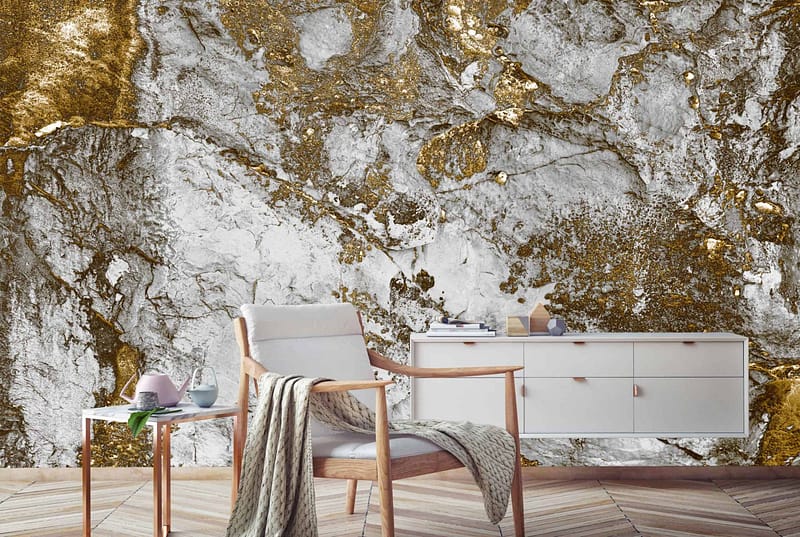 The wallpaper features tactile gold and grey abstract designs.