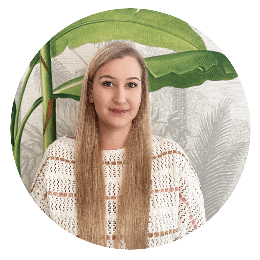 The wallpaper features a nature theme with illustrated green leaves, tropical foliage, and botanical patterns in shades of green, cream, and subtle earth tones.