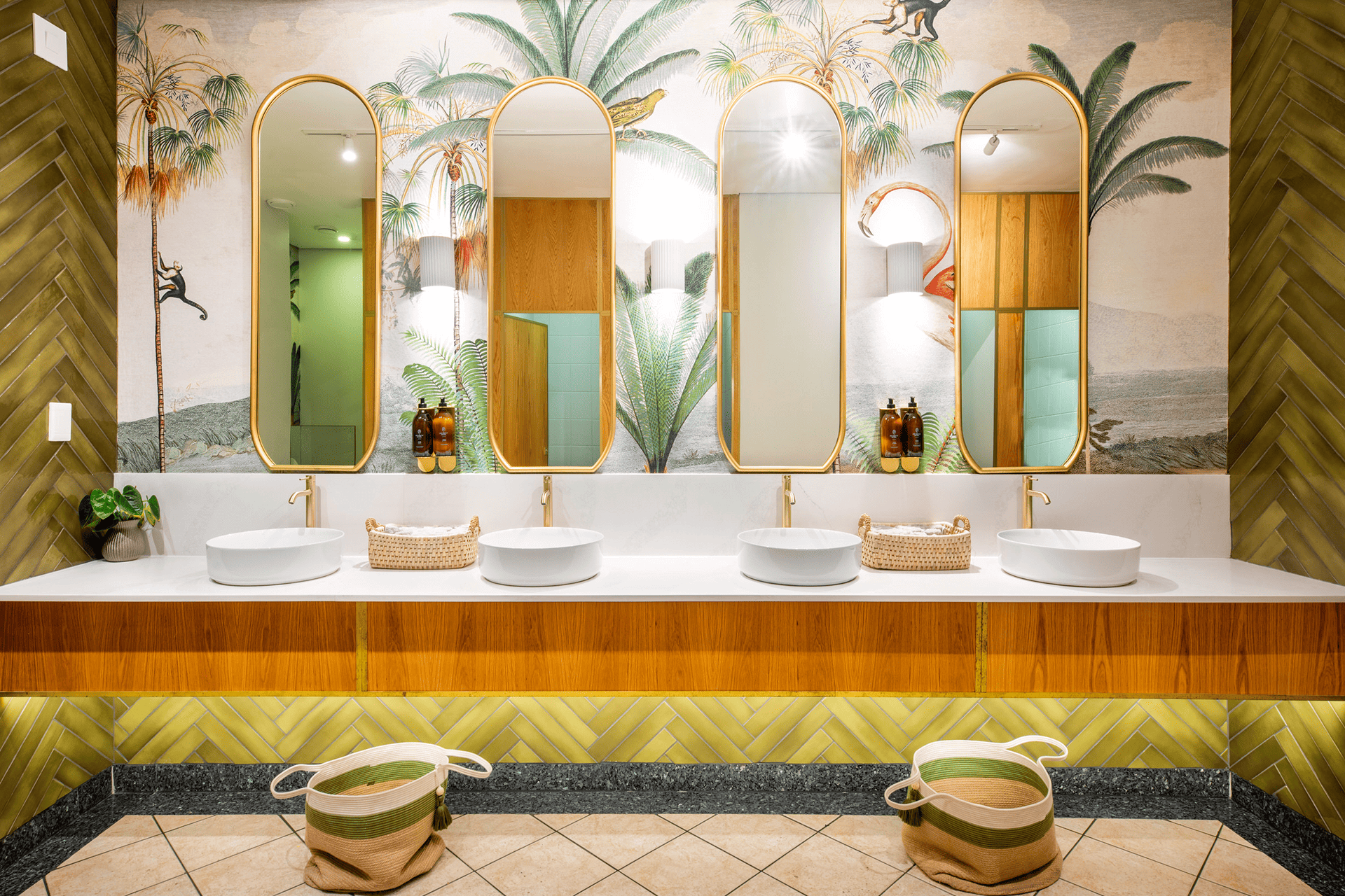 Wallpaper features: palm tree mural, lush green tones, tropical theme, leafy patterns.