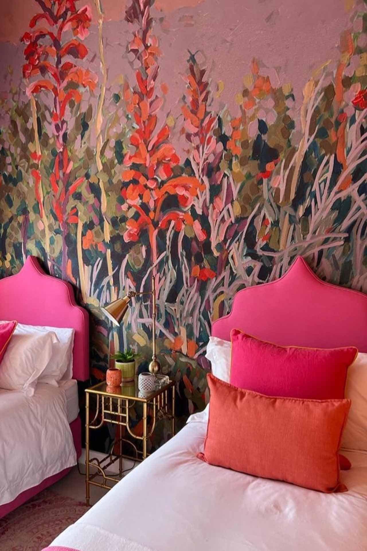 Discover a vibrant bedroom that shines with a colorful wall mural! Tall red and orange flowers stand proudly against lush greenery, creating an enchanting backdrop. Perfect for anyone looking to add lively shades of red, orange, and green to their space.