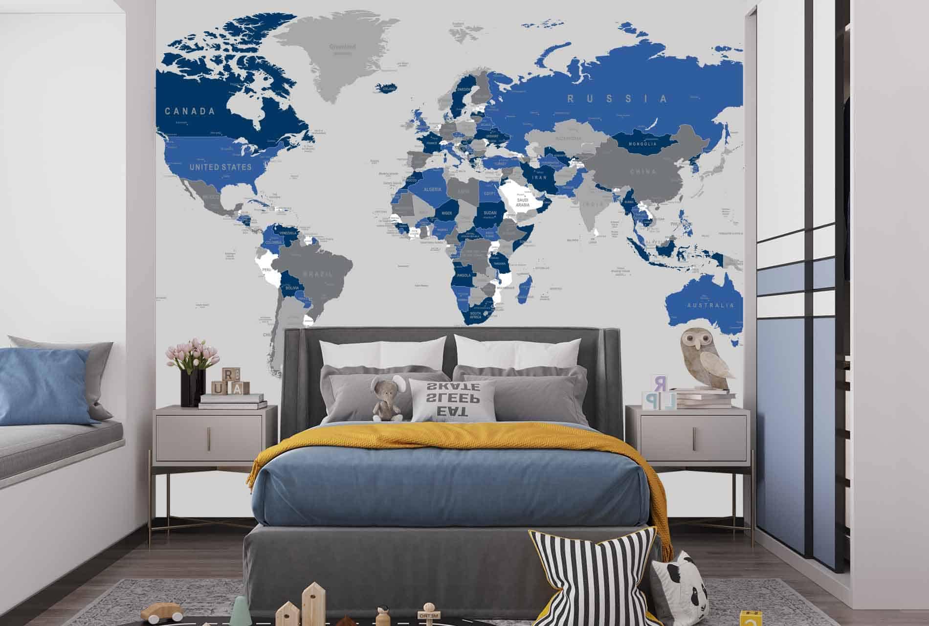The wallpaper features a large, detailed world map mural in muted tones of beige, brown, and blue. The continents are outlined clearly with varying shades to indicate topographical differences. Land masses include subtle textures and occasional vintage-style labels for major cities and countries. The calm yet adventurous color palette evokes a sense of worldly exploration.