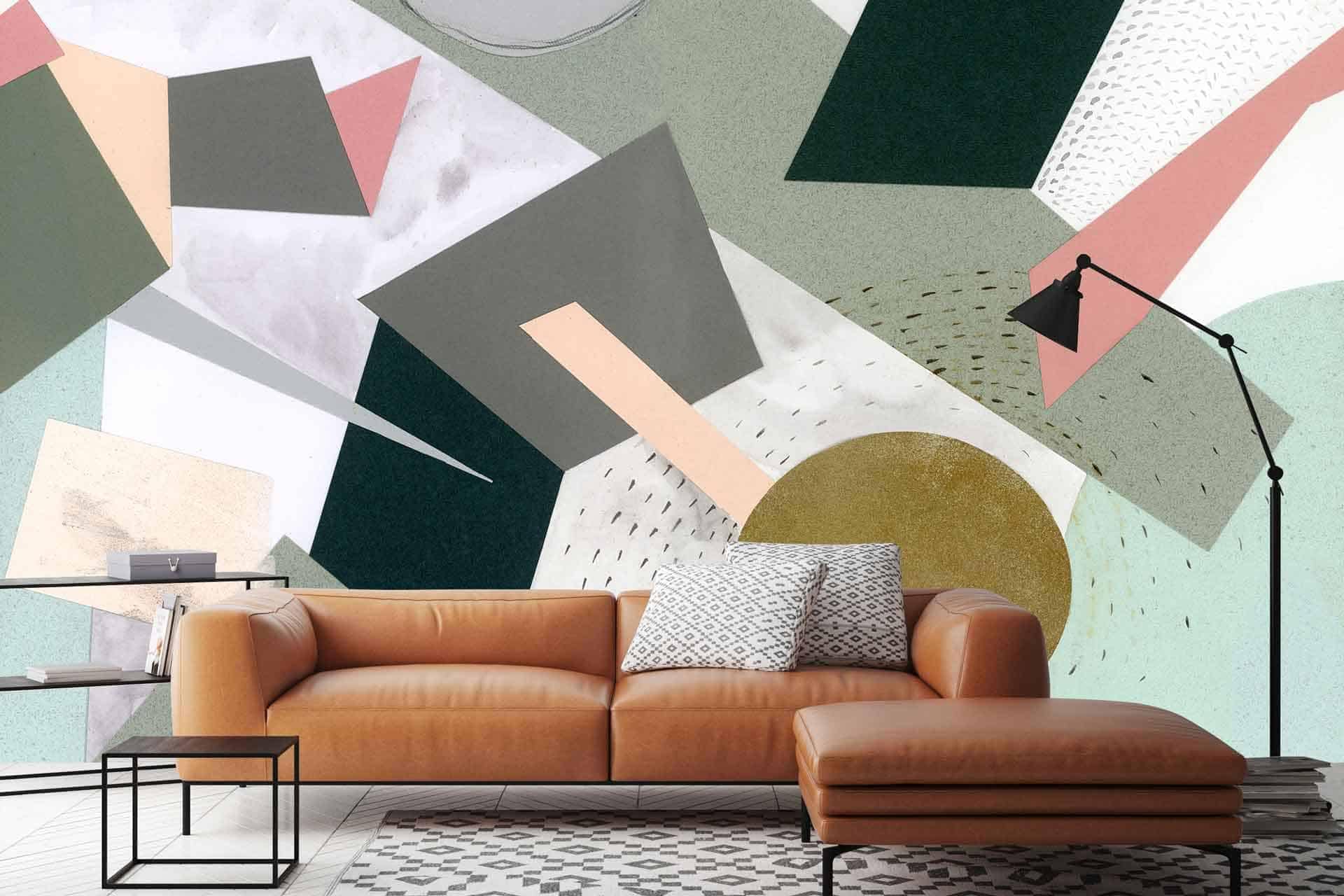 The wallpaper showcases a large abstract mural featuring shapes in pastel colors with muted tones and splashes of pink. The design includes a mix of geometric and organic forms, softly blending hues like blush, mint green, soft blue, and gentle cream for a soothing yet dynamic visual effect.
