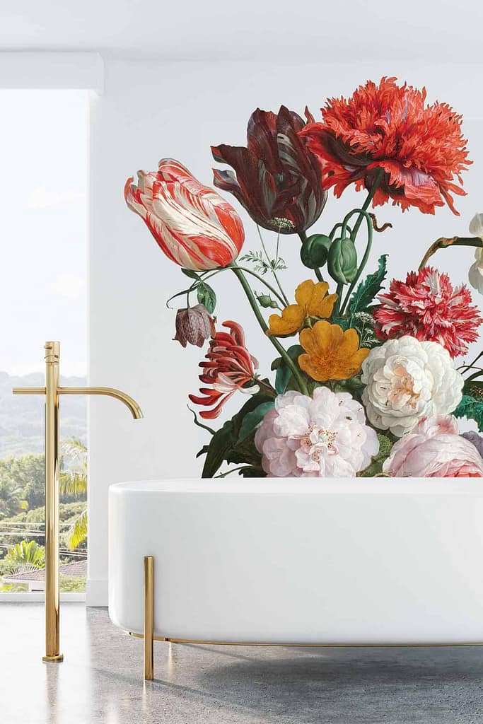 A large, vibrant floral mural featuring an array of colorful flowers, including red, pink, and orange blooms.