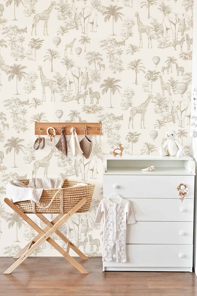 Safari-themed wallpaper with playful giraffes and lush palm trees, featuring earthy browns, greens, and soft neutral tones—perfect for a nursery inspired by wild animals and tropical foliage.