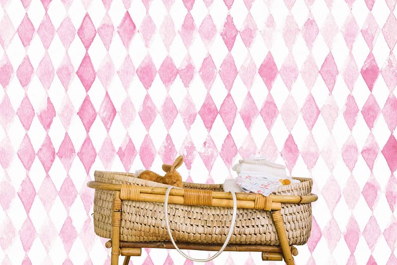 White and pink diamond-patterned wallpaper with a whimsical Fantasia vibe.