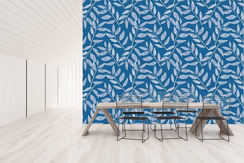 Blue leaf-patterned wallpaper with subtle nautical charm, featuring various shades of blue on a white background. The intricate leaf designs bring contrast to the room's decor.