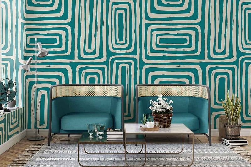 A stylish living room features *teal and beige geometric wallpaper*.
