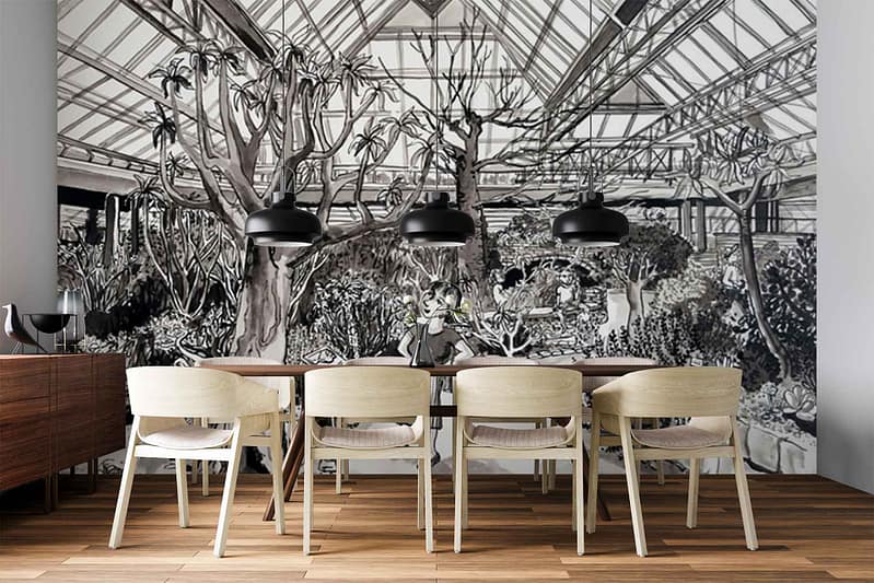 Large black-and-white mural wallpaper depicting a greenhouse scene with botanical elements, including detailed plants, glass panes, architectural grid lines, and foliage. Monochrome palette—primarily shades of black, white, and gray—creates a striking graphic backdrop.