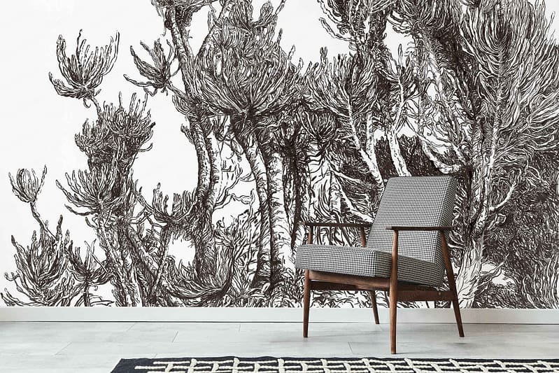 A large, intricate black and white botanical illustration wallpaper fills the background, featuring detailed leaves and floral patterns in monochrome tones.