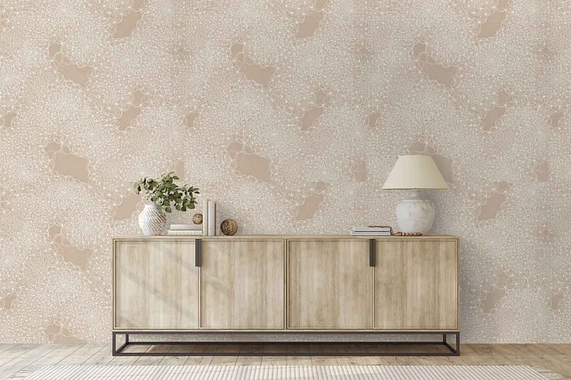 Pastel-patterned wallpaper features soft hues of blue, pink, and sandy beige in gentle, flowing shapes and subtle coastal-inspired motifs.