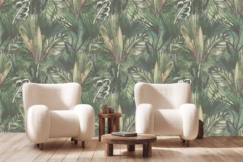 Wallpaper features a tropical theme with lush, green leaves. Elements include various shades of green, emphasizing large leafy patterns. Hints of darker greens and occasional light highlights create depth and vibrancy in the design.