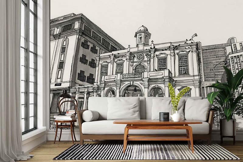 The wallpaper features a large cityscape mural with illustrated Old Town House buildings. The design includes detailed facades, arched windows, and gabled rooftops in a palette of muted grays, warm beige, terracotta, soft blues, and brick reds. Architectural elements like chimneys and ornate doors are prominent throughout the mural.