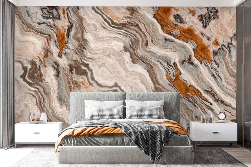 The wallpaper behind the bed features a striking, abstract marble design with elements in shades of orange, brown, beige, and gray.