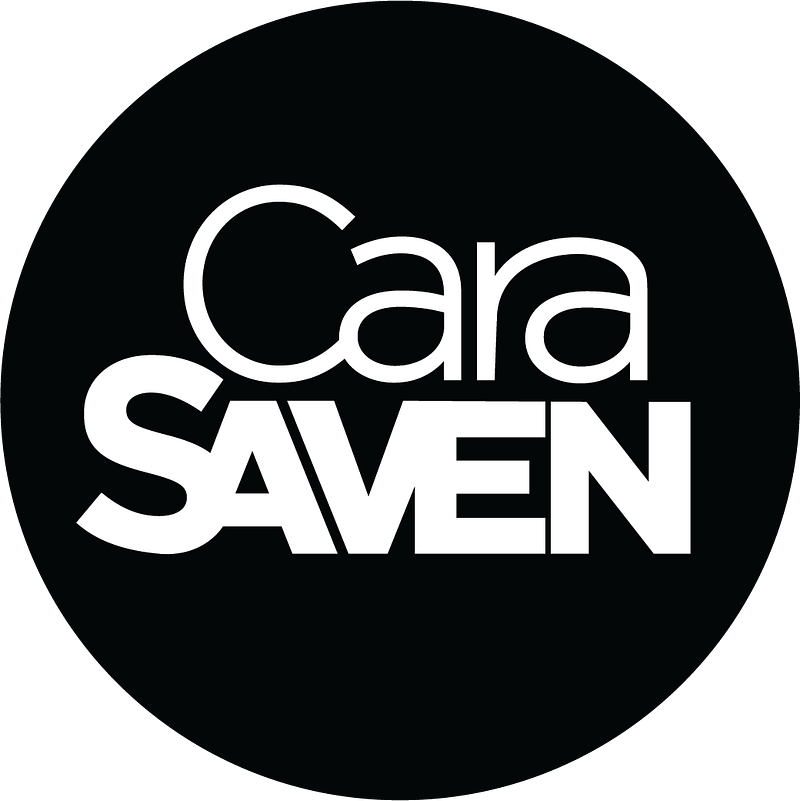 Black circular background with bold, modern white text "Cara Saven" in two lines; "Cara" above "SAVEN" in smaller size. Reflects Cara Saven designer wallpaper’s signature style using a striking black-and-white color palette and clean, minimalist elements.